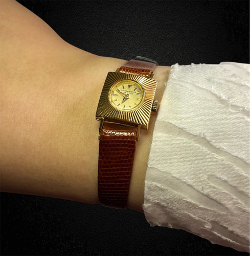 Montre BAUME ET MERCIER - montre dame design 58 Facettes