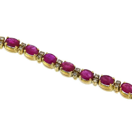 Bracelet Bracelet en or jaune avec diamants et rubis 58 Facettes G3886
