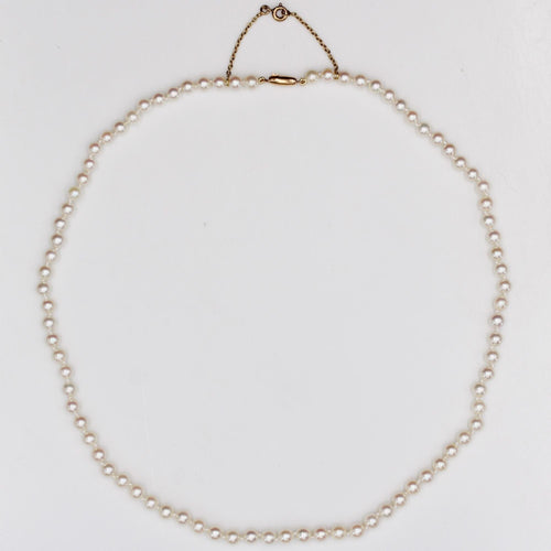 Collier Collier de perles blanches en choker 58 Facettes 24-013