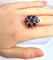 54 Importante bague or jaune, 7 saphirs et 6 rubis 58 Facettes AB454