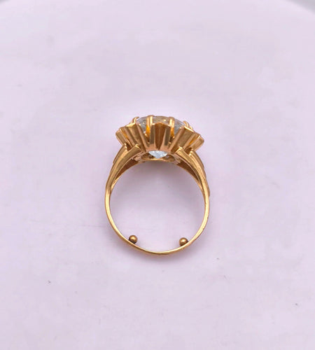 Bague 56 Bague cocktail en or jaune ornée d'une importante Aigue marine 58 Facettes
