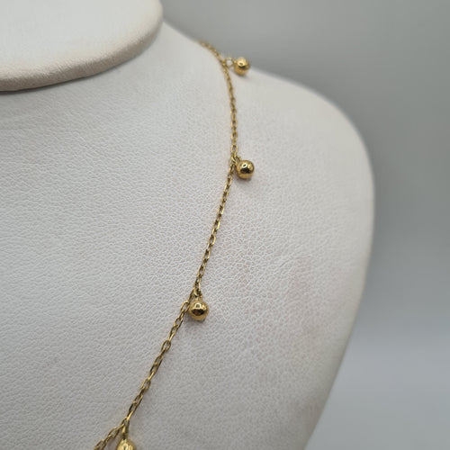 Collier Collier or jaune 18 carats serti de billes d’or 58 Facettes