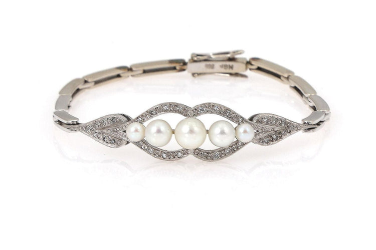 Bracelet Bracelet en or blanc avec perles et diamants 58 Facettes 10232