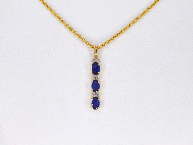 Pendentif Pendentif en or avec diamants et saphir 58 Facettes 2137