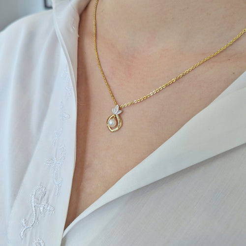 Pendentif Pendentif en or jaune, diamant et perle 58 Facettes 32247