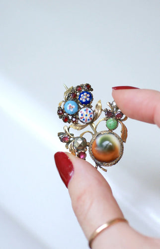 Broche Broche ancienne operculum, grenat, et porcelaine 58 Facettes