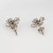 Boucles d'oreilles Tiffany & Co - Boucles d'oreilles fleurons en platine et diamants 1994 58 Facettes 1994 Tiffany & Co Diamond Floret Earrings Vintage Platinum Flowers Signed