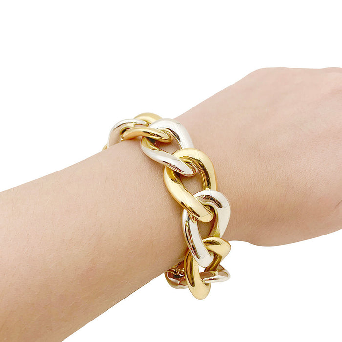 Armband Chaumet, große Glieder in zwei Goldtönen.