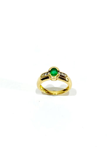 Bague 51 Bague or jaune, émeraude et diamants 58 Facettes