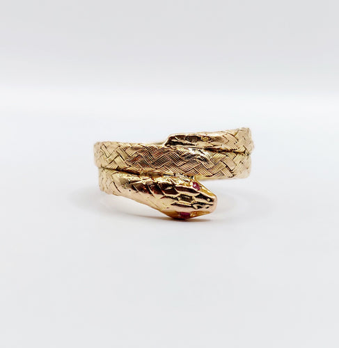Bague 54.5 Bague serpent or rose finement tressée yeux rubis 58 Facettes A04370