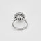 Bague 49 Bague marguerite en or blanc, platine et diamants 58 Facettes B250467