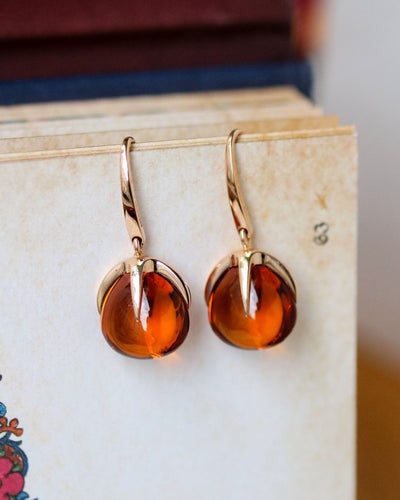 Boucles d'oreilles Paire de Boucles d'Oreilles signées "Pomellato" Or rose et Quartz de Madère 58 Facettes A11522