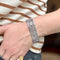Bracelet Bracelet manchette tissé or gris 58 Facettes REF24086-249