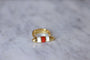 Bague fuseau moderniste or, corne, et corail 58 Facettes