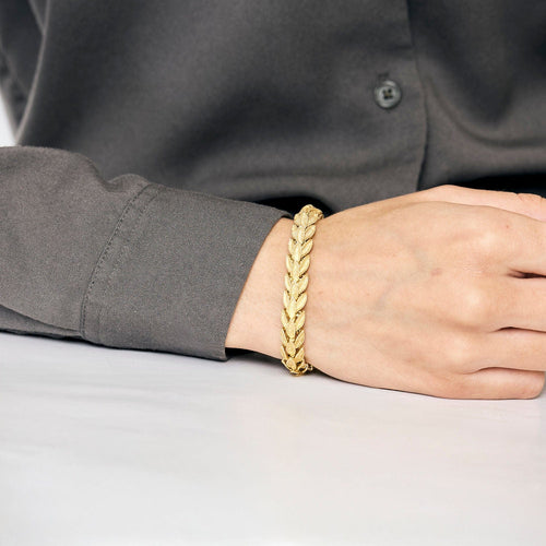 Bracelet Bracelet or jaune à motif de feuilles 58 Facettes CHAL0241