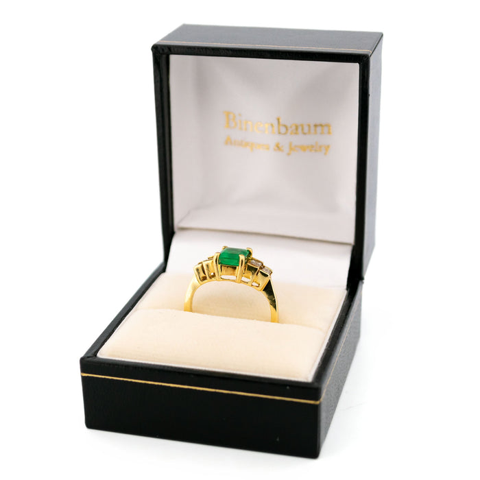 Yellow gold emerald diamond ring