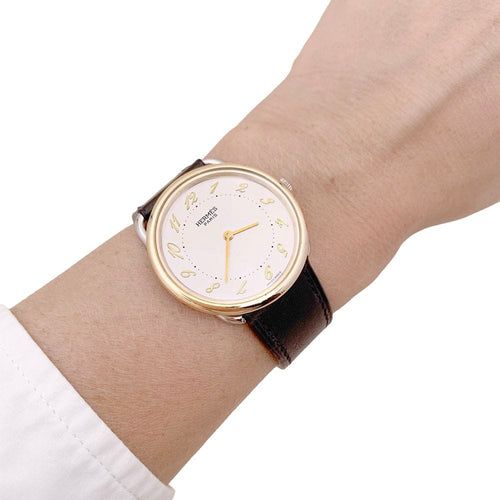 Montre Montre HERMÈS, "Arceau", plaqué or et acier. 58 Facettes 34828