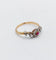 Bague 55 Bague marguerite antique or rose, rubis et diamants (c.1890) 58 Facettes A05453