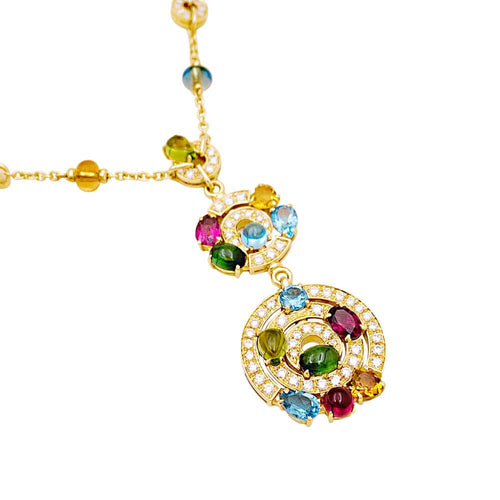 Collier Collier BULGARI "Astrale", or jaune, diamants et pierres de couleur. 58 Facettes 34838