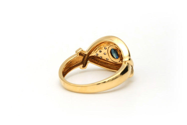 Bague 52 Bague en or jaune sertie d'un saphir et de diamants 58 Facettes B564