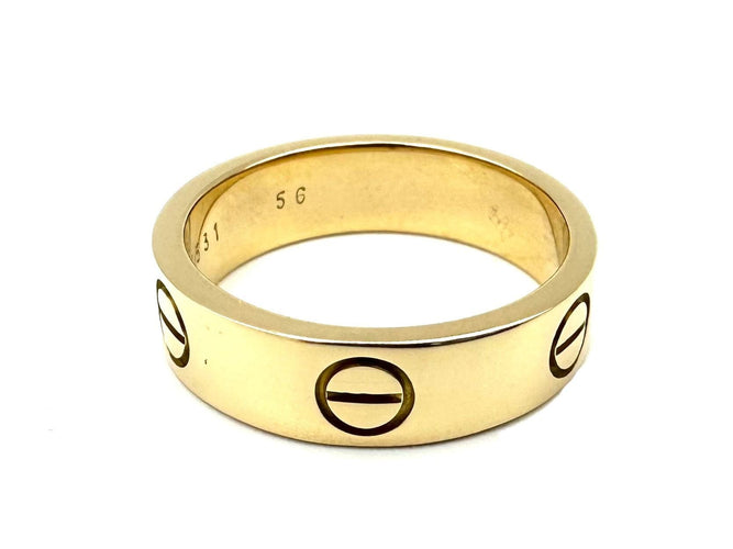 Bague 56 CARTIER. Collection "LOVE", Bague or jaune 18K 58 Facettes