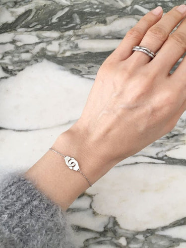 DINH VAN - Bracelet menottes en or blanc 58 Facettes