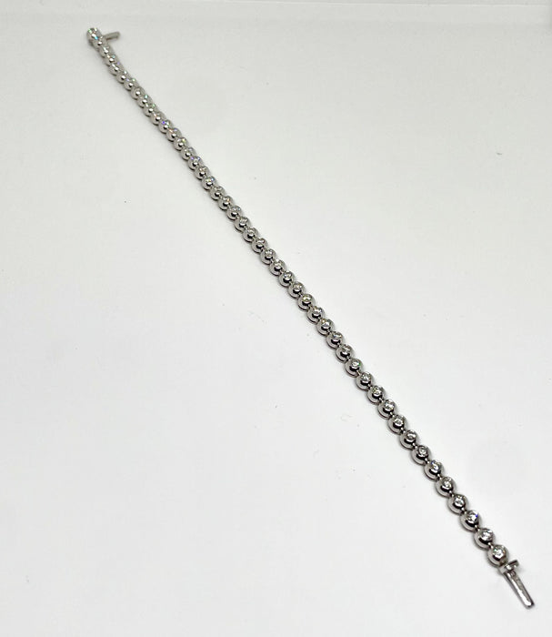 White gold tennis river bracelet 1.84 cts