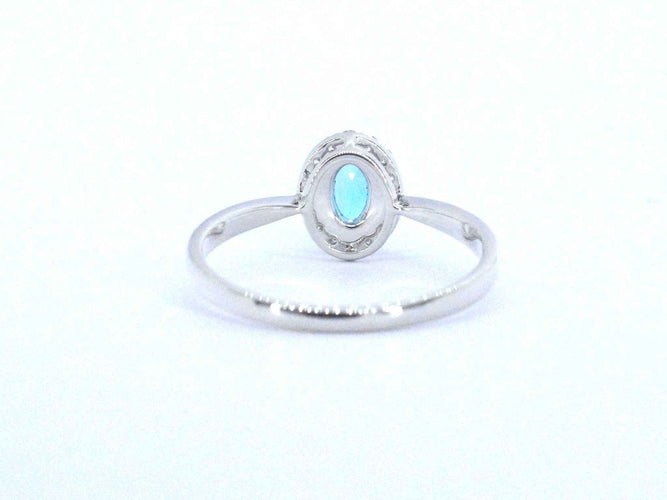 White gold ring with a blue topaz and natural diamonds 58 Facettes 2367