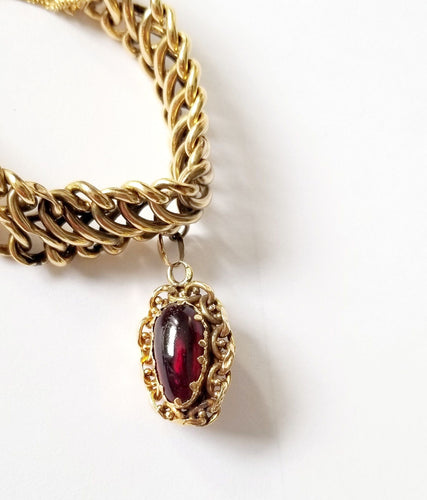 Bracelet Bracelet maille américaine or jaune 18 carats et breloques - 17 cms - 36.25 grs 58 Facettes