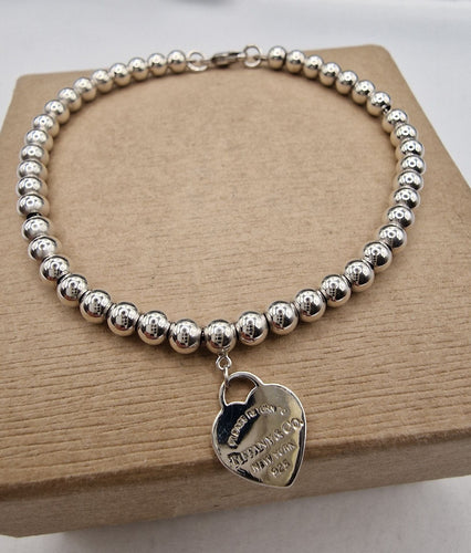 Bracelet Bracelet de la collection Tag Beads de Tiffany & Co. en argent 925 58 Facettes