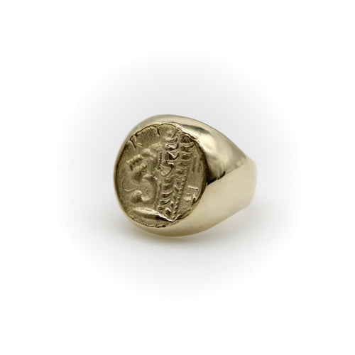Vintage yellow gold lion-headed coin signet ring