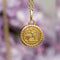 Pendentif Petite médaille Sagittaire en or rose 58 Facettes CVP199