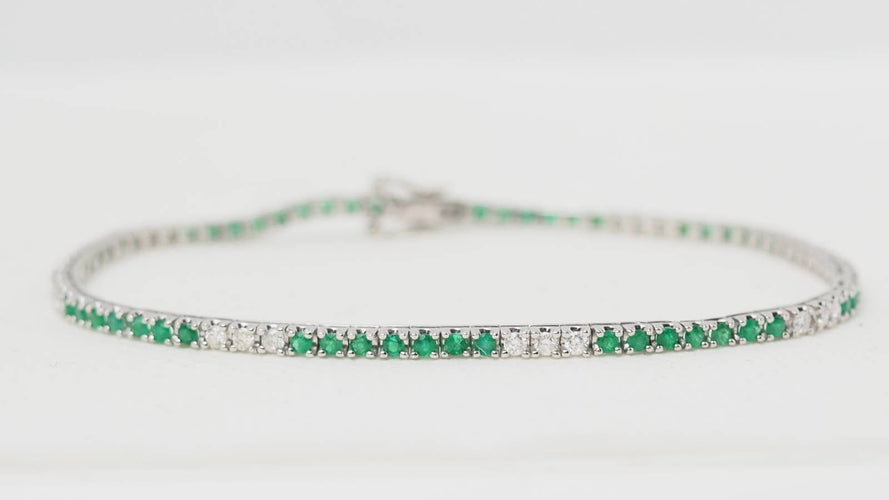 Bracelet Bracelet rivière en or blanc, émeraudes et diamants 58 Facettes 32238