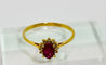 Bague Bague en or jaune avec un saphir rose ovale et des diamants 58 Facettes 50291