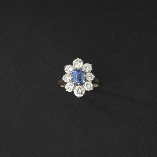 Bague 54 Bague marguerite en or blanc, saphir Ceylan naturel et diamants. 58 Facettes