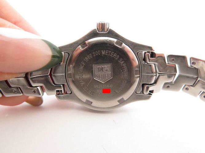 Montre montre TAG HEUER link lady 27 mm quartz acier palladie 58 Facettes 259317