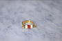 Bague fuseau moderniste or, corne, et corail 58 Facettes