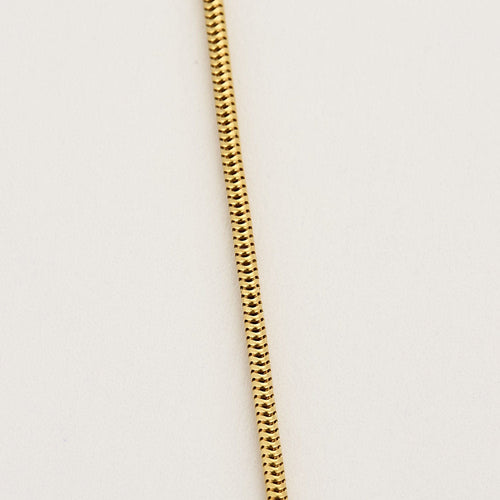 Collier Collier or jaune maille serpent et pépite d'or 58 Facettes ALE4276