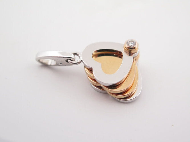 Pendentif pendentif CARTIER charm trefles coeurs or jaune blanc diamant 58 Facettes 264290