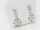 Boucles d'oreilles Paire de dormeuses anciennes en or blanc et diamants 58 Facettes 32108
