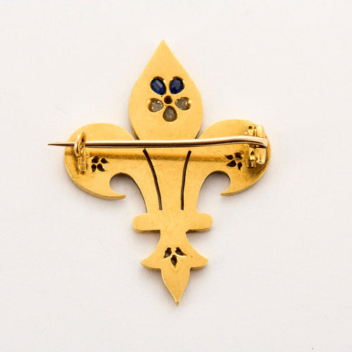 Broche Broche fleur de Lys, or jaune, émail, diamants, saphir et rubis 58 Facettes LIS1811
