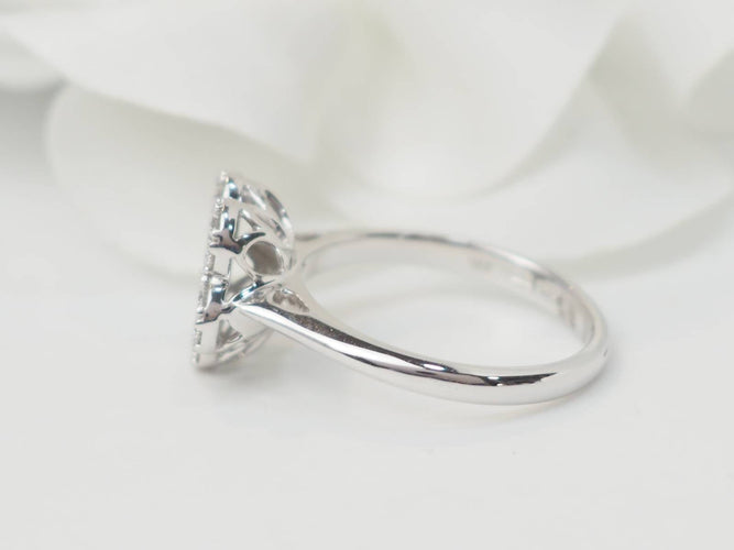 Bague 52 Bague fleur en or blanc et diamants 58 Facettes 21524