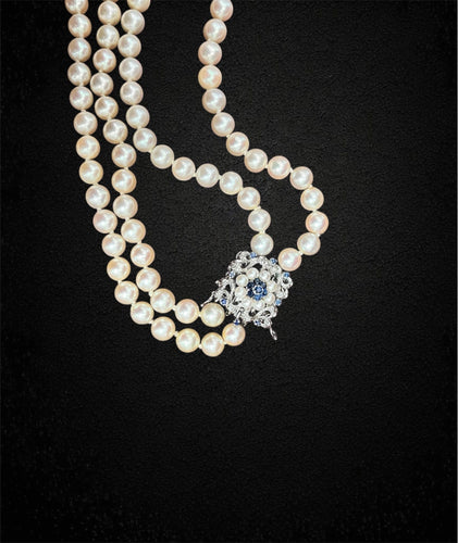 Collier Magnifique collier de perles à double rang 58 Facettes