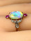 Bague 53 Bague en or jaune, opale, diamants et rubis. Vers 1900. 58 Facettes AB639