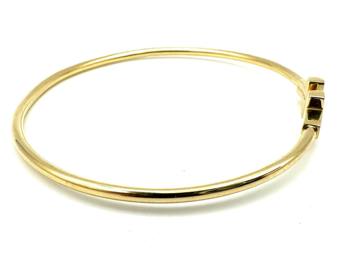 Bracelet TIFFANY & Co. Collection "T", bracelet or jaune 18K 58 Facettes