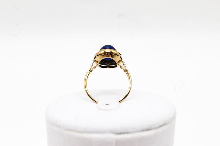 Bague Bague or jaune, platine, saphir cabochon 58 Facettes 250101