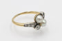 Bague 54 Bague ancienne Art Nouveau en or jaune ornée de perles et de diamants, début du XXe siècle 58 Facettes 11387