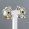 Boucles d'oreilles Boucles d'oreilles bicolores en or serties de diamants taille brillant 58 Facettes
