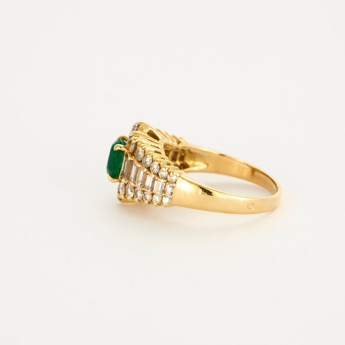 Smaragd diamanten kousenband ring