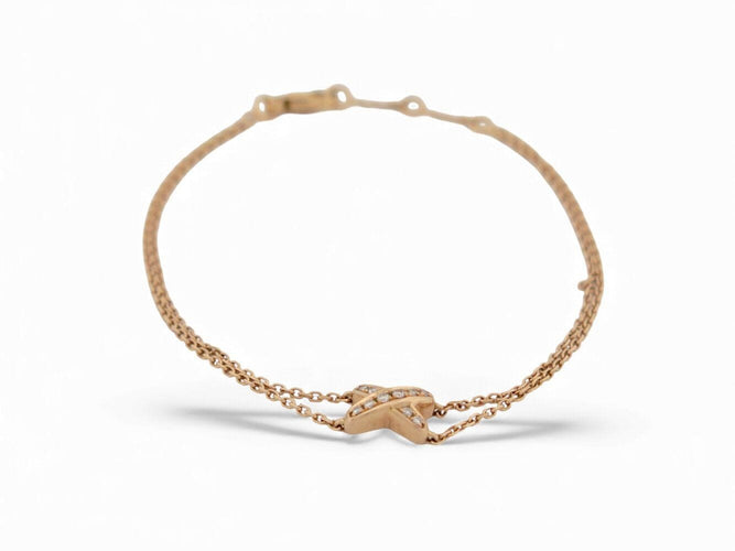 Bracelet bracelet CHAUMET jeux de liens en or rose 18k 3gr 10 diamants 0.1ct boite 58 Facettes 271111